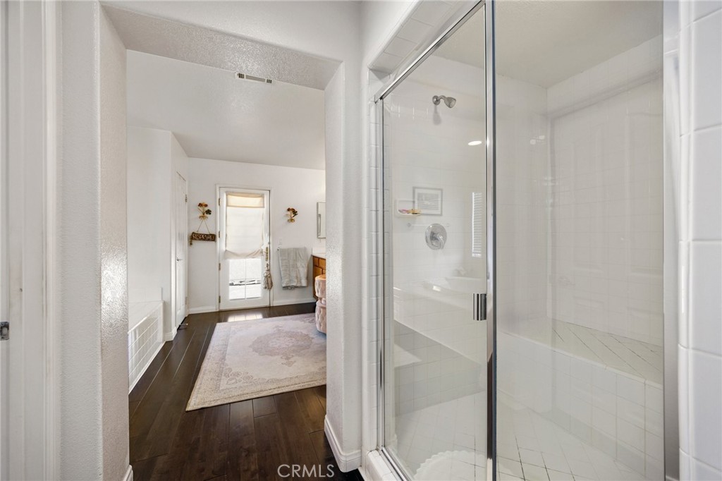 34695 Desert Road Acton, CA 93510 - Photo 54 of 68 a bathroom with a glass shower door
