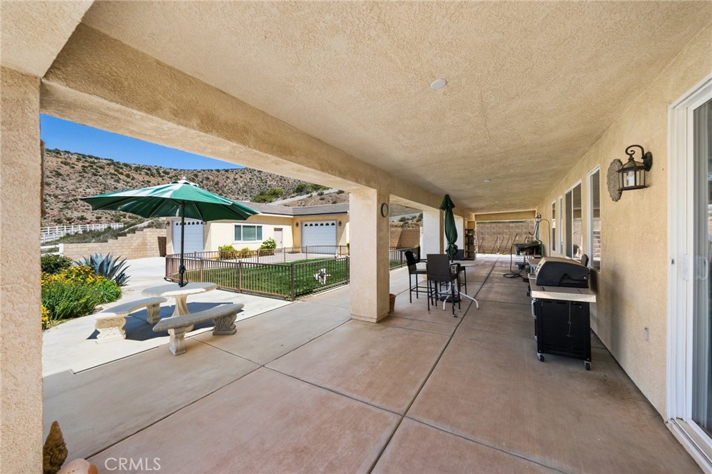 34695 Desert Road Acton, CA 93510 - Photo 8 of 68 a outdoor space with patio furniture and potted plants