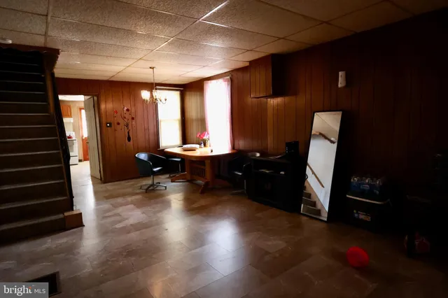 a room with furniture and wooden floor