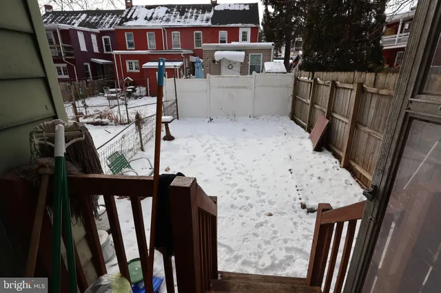 a view of balcony with furniture