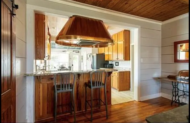 a view of a kitchen from a dining room