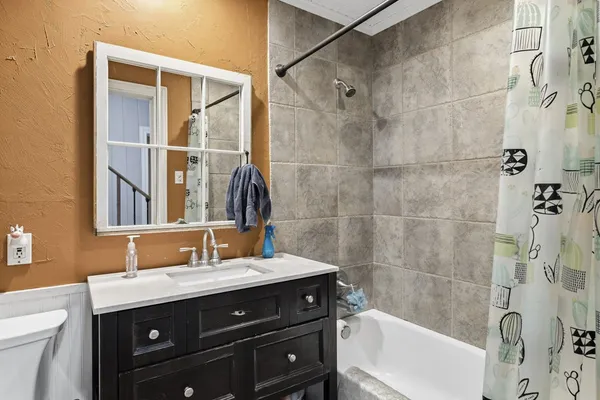 a view of a storage & utility room with wooden floor
