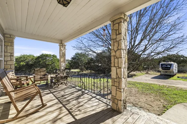 a view of a backyard of the house