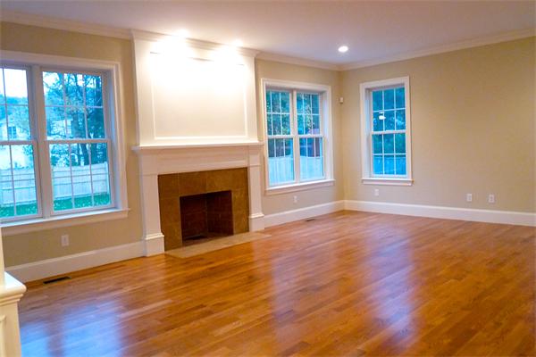 604 High Rock Street Needham, MA 02492 - Photo 4 of 9 a view of an empty room with wooden floor and a window