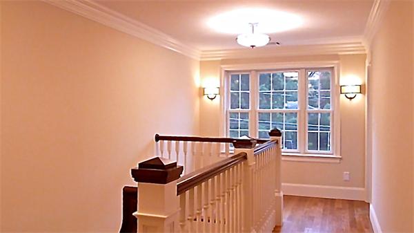 604 High Rock Street Needham, MA 02492 - Photo 8 of 9 a view of a hallway with windows