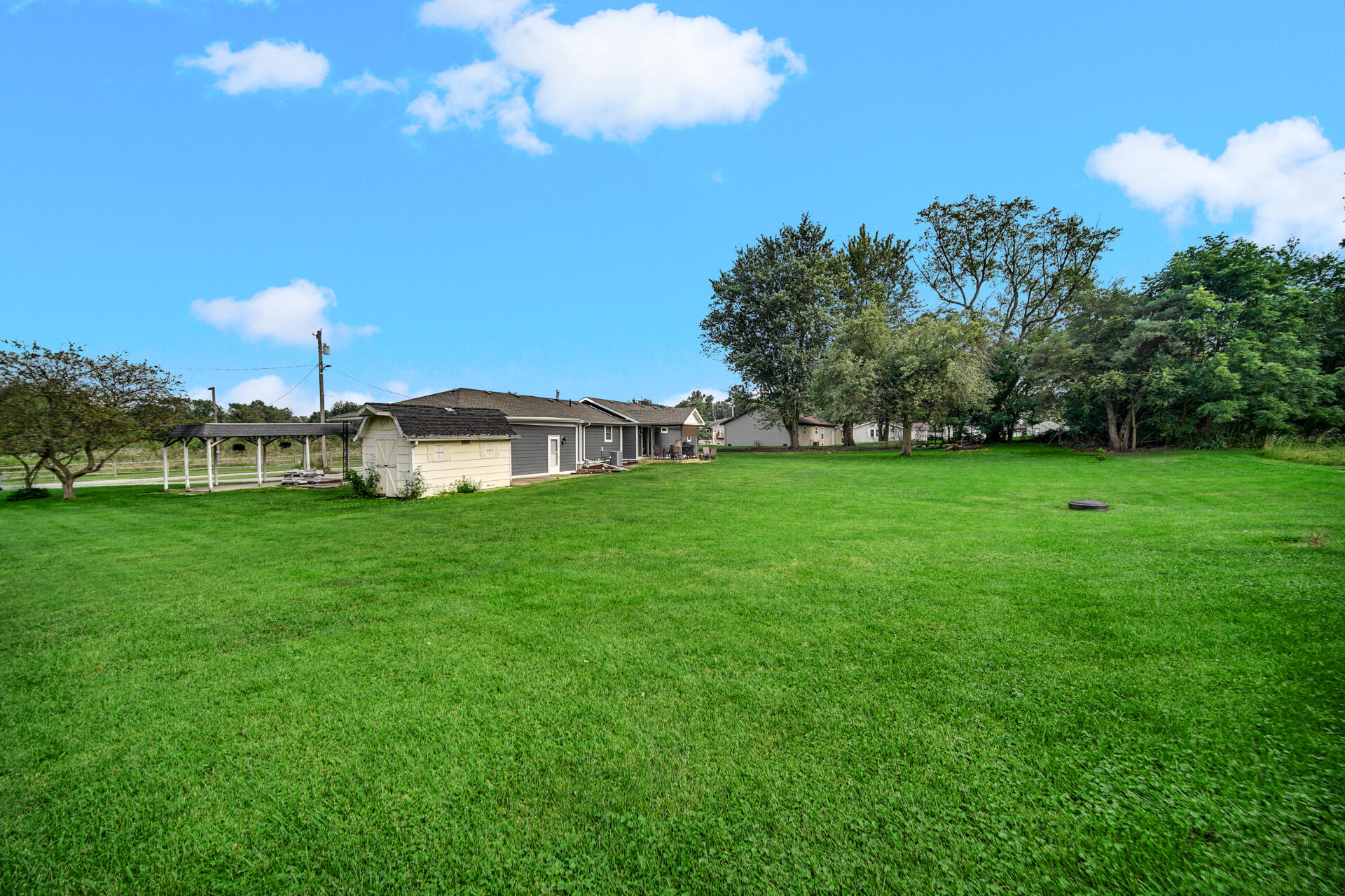 12 South Fish Lake Road Valparaiso, IN 46385 - Photo 21 of 21 a view of a house with a big yard