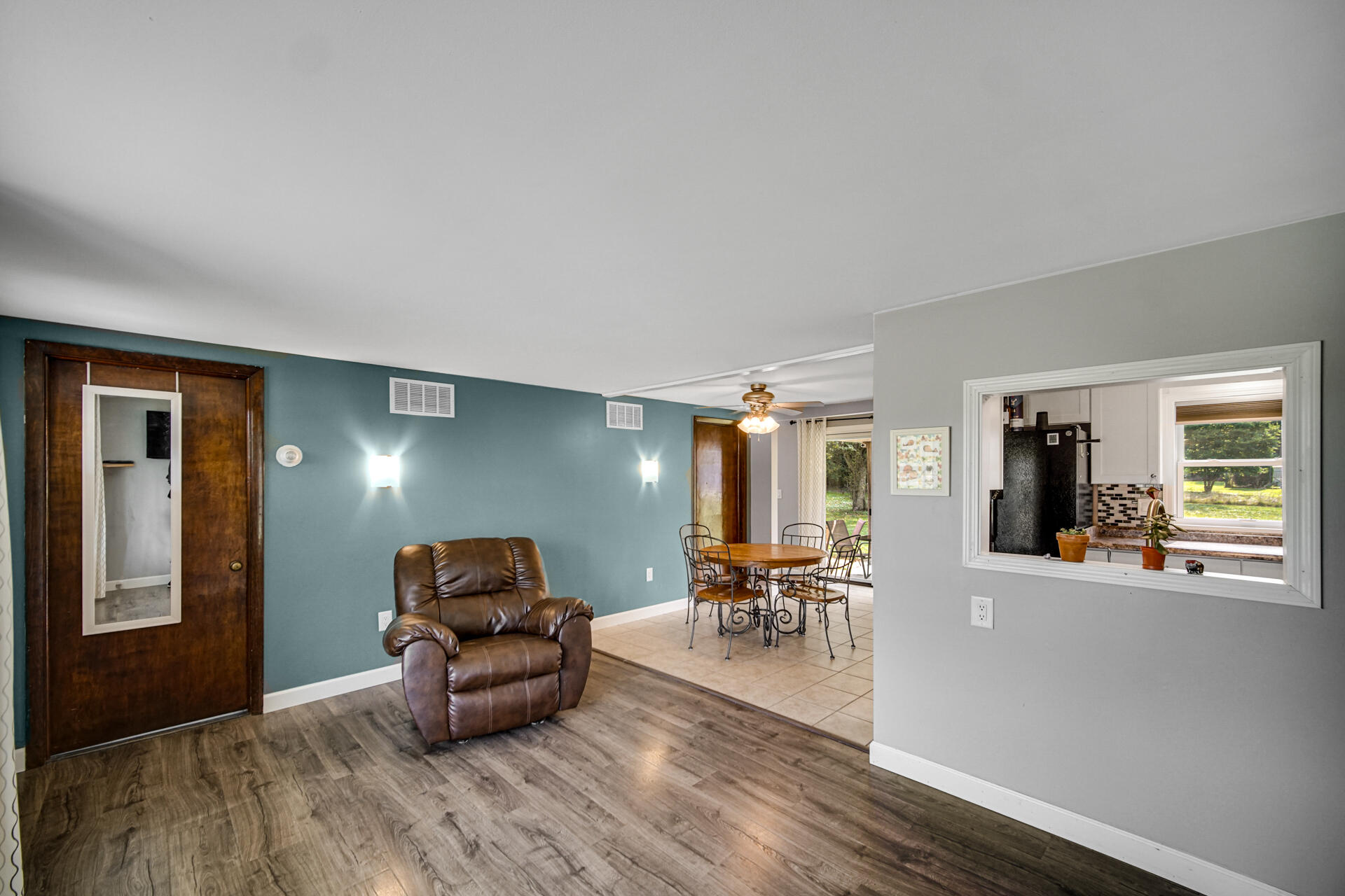 12 South Fish Lake Road Valparaiso, IN 46385 - Photo 4 of 21 a living room with furniture and a wooden floor
