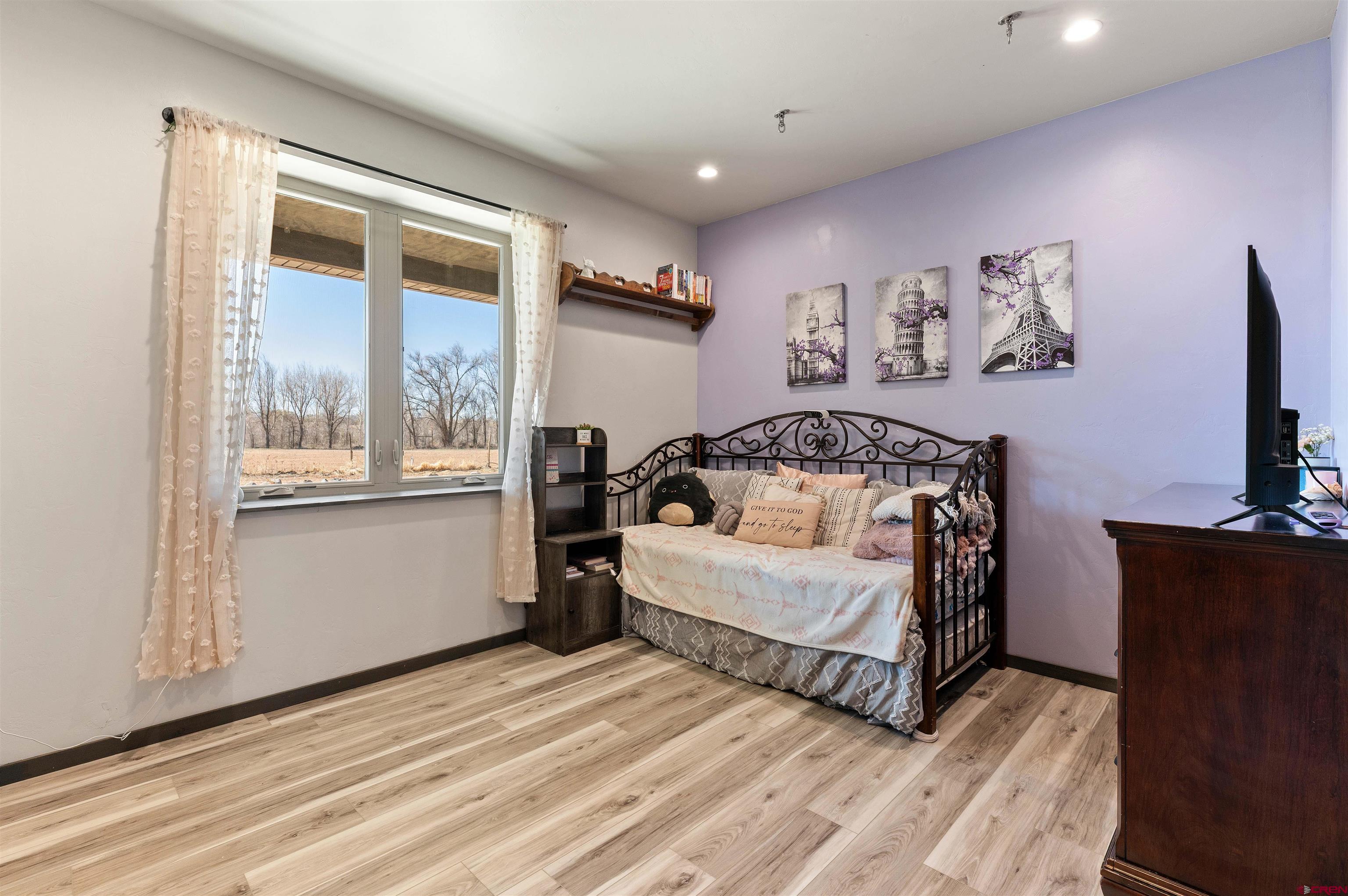 55347 Begonia Road Delta, CO 81416 - Photo 11 of 44 a spacious bedroom with a bed and a window