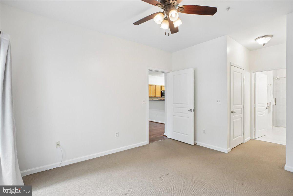 Undisclosed Address Reston, VA 20190 - Photo 18 of 60 Bedroom and Hallway to the Bathroom
and 2 Closets