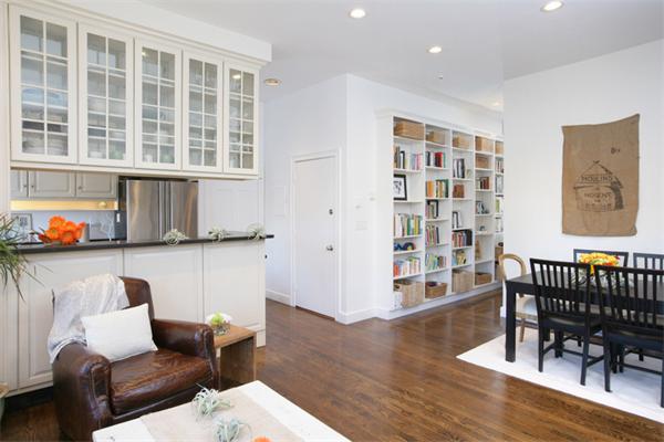 68 Waltham Street, Unit 3 Boston, MA 02118 - Photo 3 of 8 a living room with furniture and a window