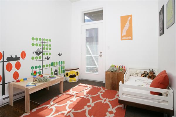 68 Waltham Street, Unit 3 Boston, MA 02118 - Photo 5 of 8 a bedroom with a bed and a couch