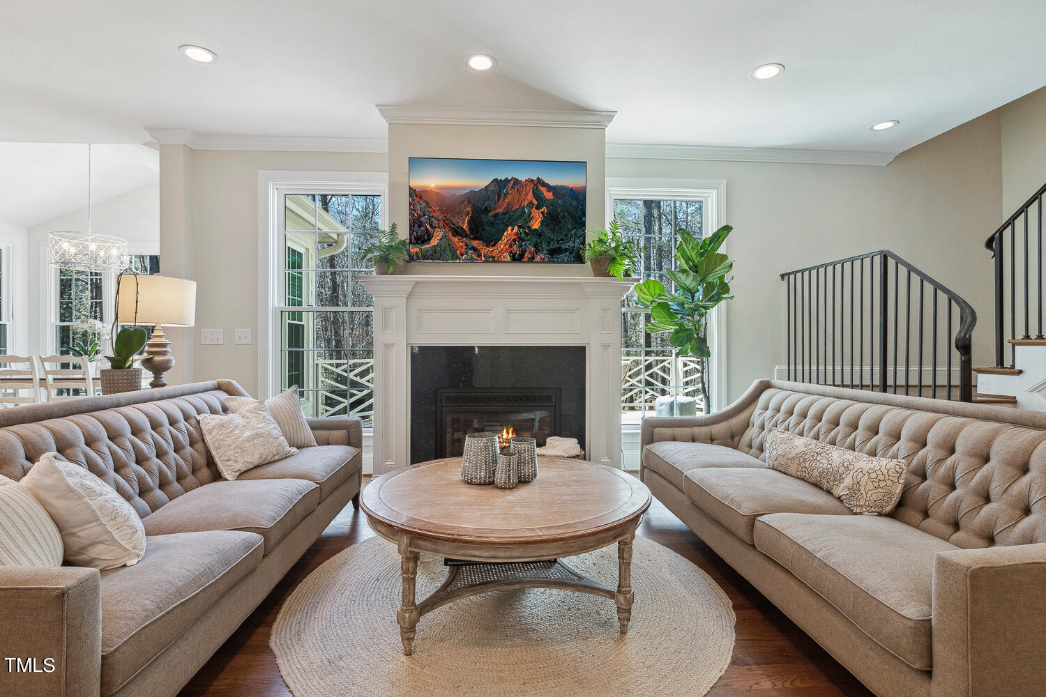 5012 Boulder Creek Lane Raleigh, NC 27613 - Photo 19 of 100 a living room with furniture and a fireplace