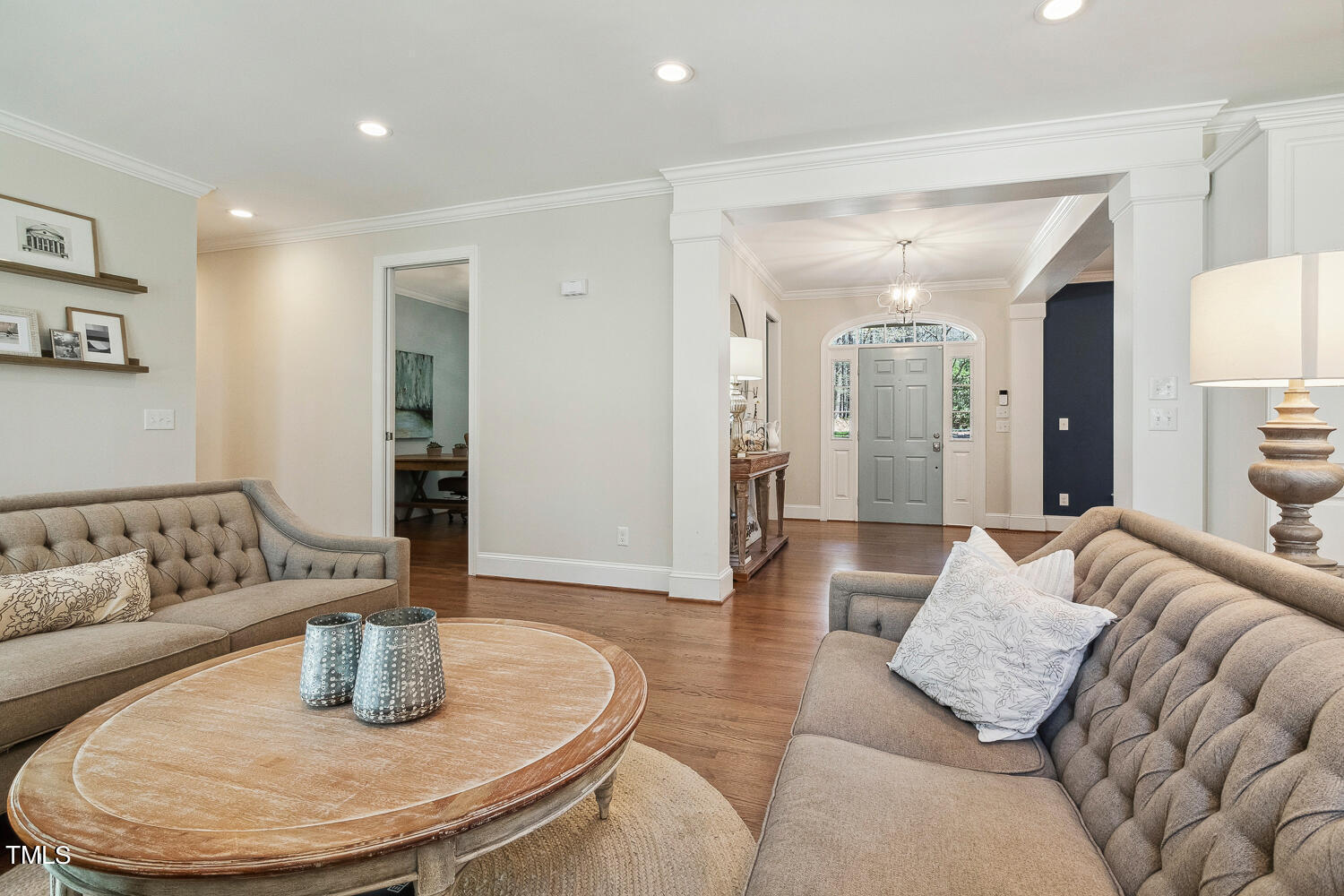5012 Boulder Creek Lane Raleigh, NC 27613 - Photo 20 of 100 a living room with furniture and a wooden floor