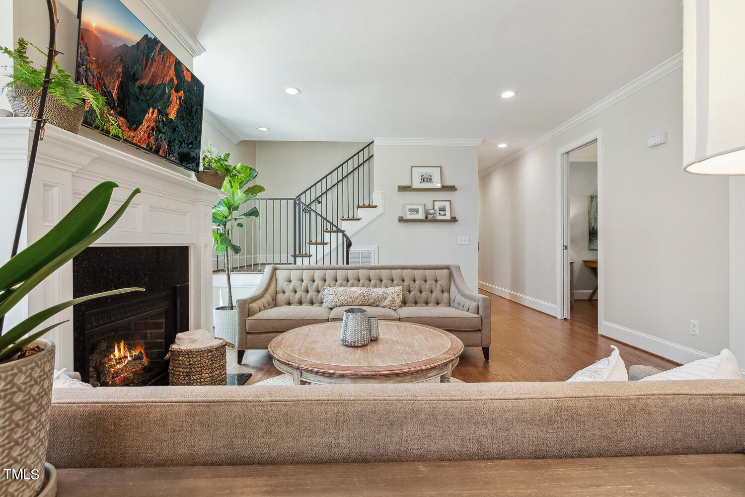 5012 Boulder Creek Lane Raleigh, NC 27613 - Photo 22 of 100 a living room with furniture and a fireplace