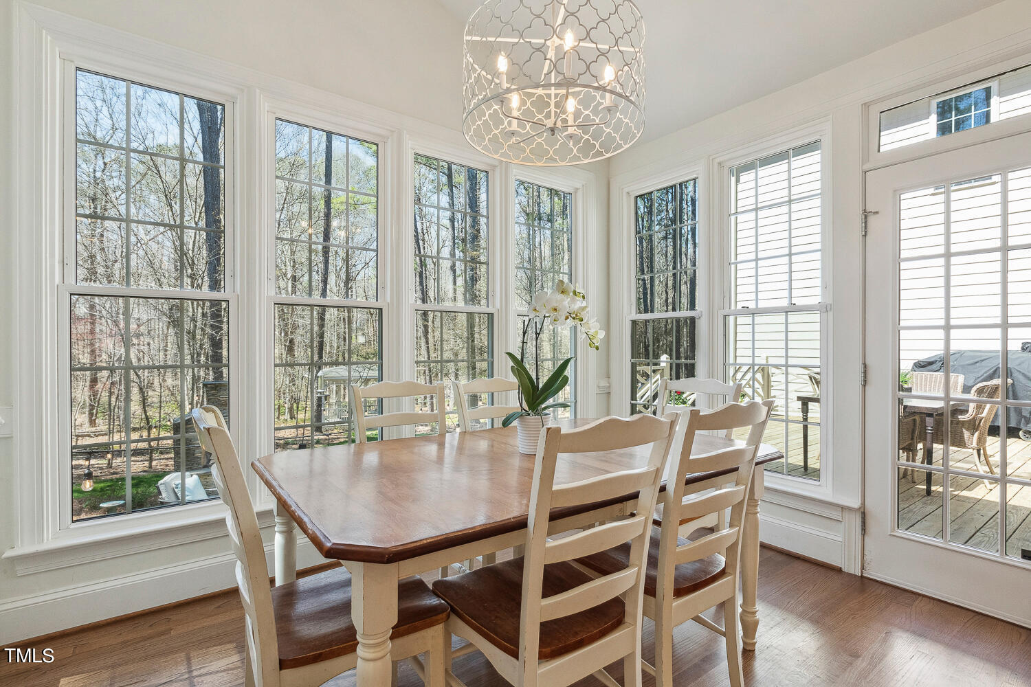 5012 Boulder Creek Lane Raleigh, NC 27613 - Photo 35 of 100 a dining room with furniture window wooden floor