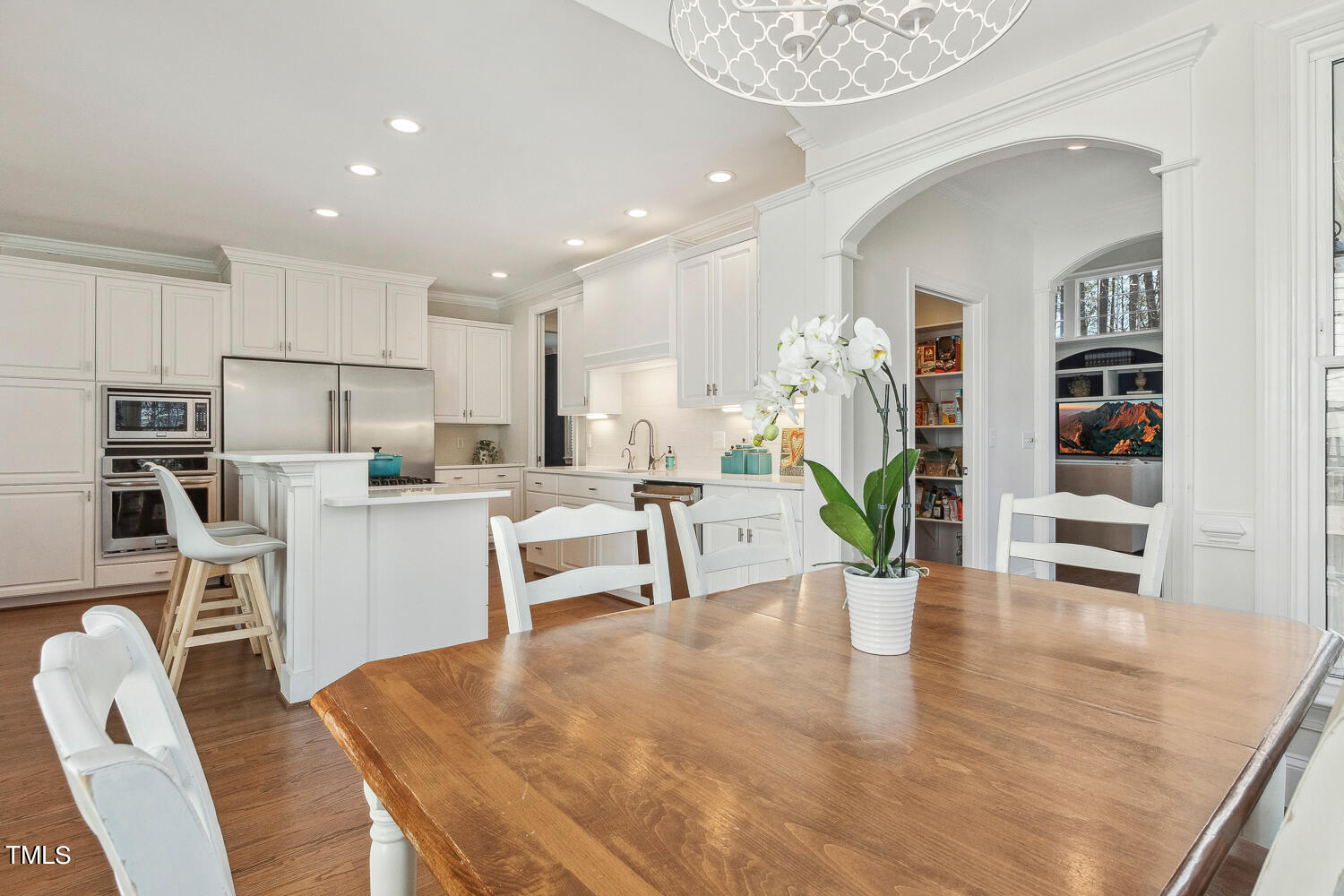 5012 Boulder Creek Lane Raleigh, NC 27613 - Photo 36 of 100 a living room with dining table furniture and kitchen view