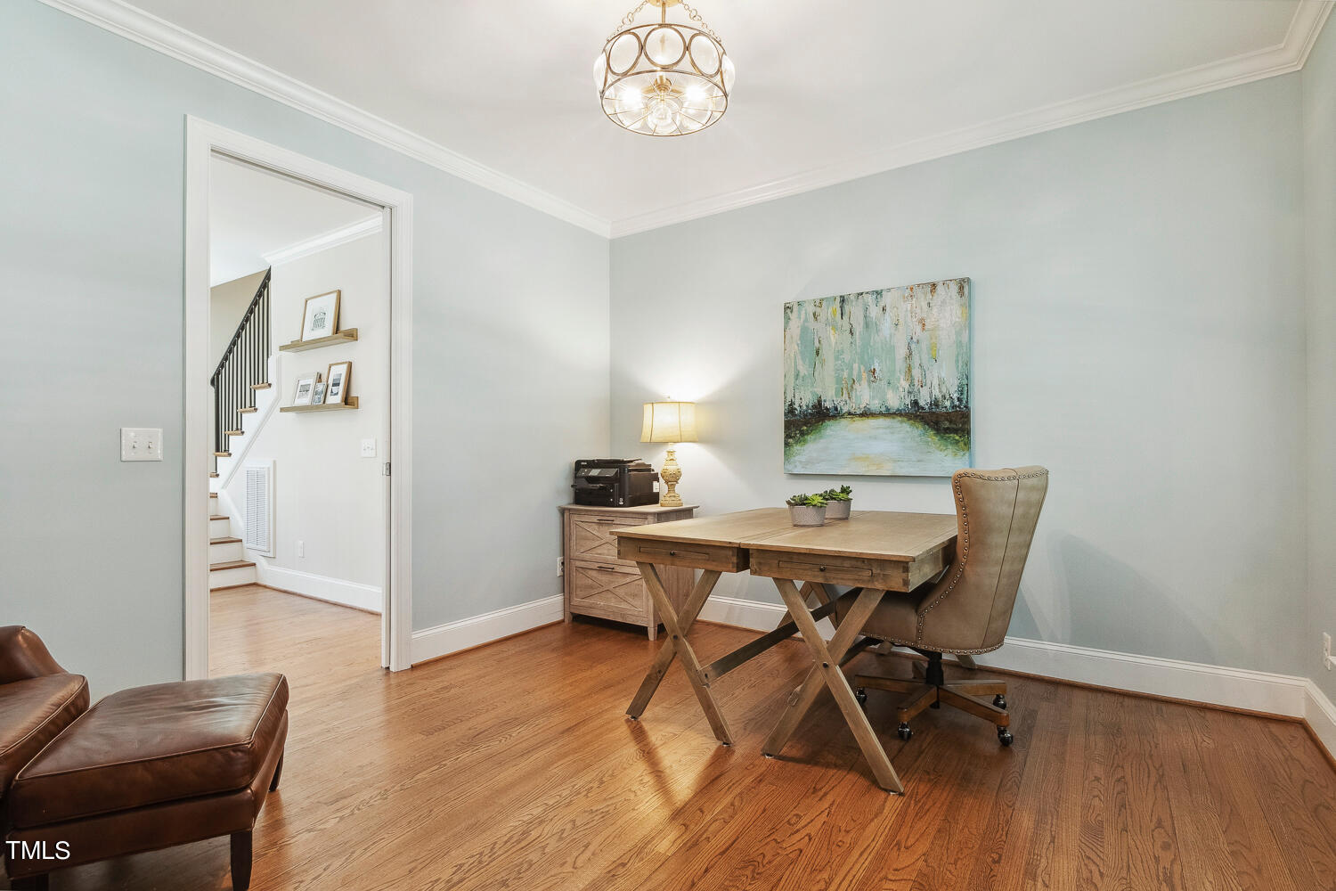 5012 Boulder Creek Lane Raleigh, NC 27613 - Photo 45 of 100 a view of a dining room with furniture and wooden floor