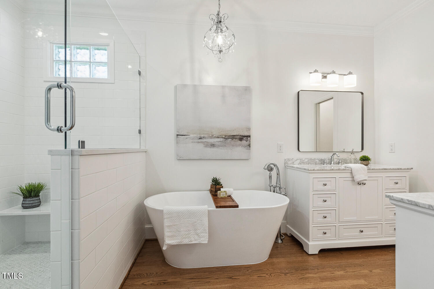5012 Boulder Creek Lane Raleigh, NC 27613 - Photo 53 of 100 a white bath tub sitting in a bathroom