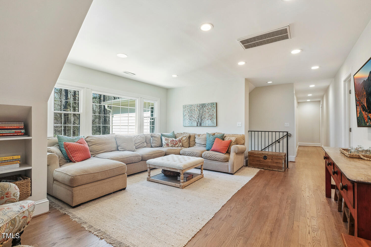 5012 Boulder Creek Lane Raleigh, NC 27613 - Photo 60 of 100 a living room with furniture and a table