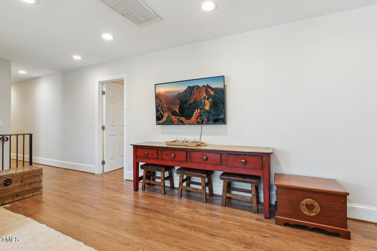 5012 Boulder Creek Lane Raleigh, NC 27613 - Photo 62 of 100 a view of a livingroom with furniture and wooden floor