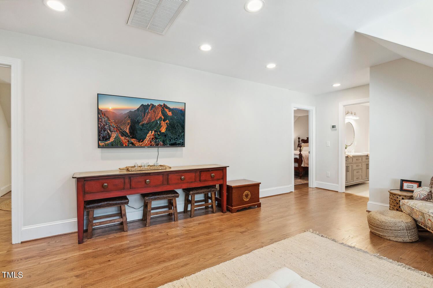 5012 Boulder Creek Lane Raleigh, NC 27613 - Photo 64 of 100 a living room with furniture and a flat screen tv