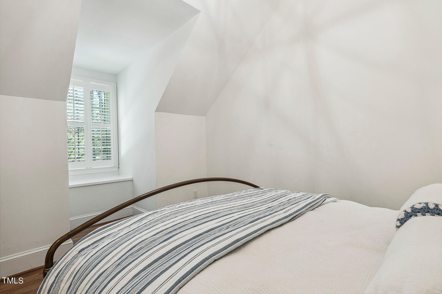 5012 Boulder Creek Lane Raleigh, NC 27613 - Photo 75 of 100 a bedroom with a bed and a window