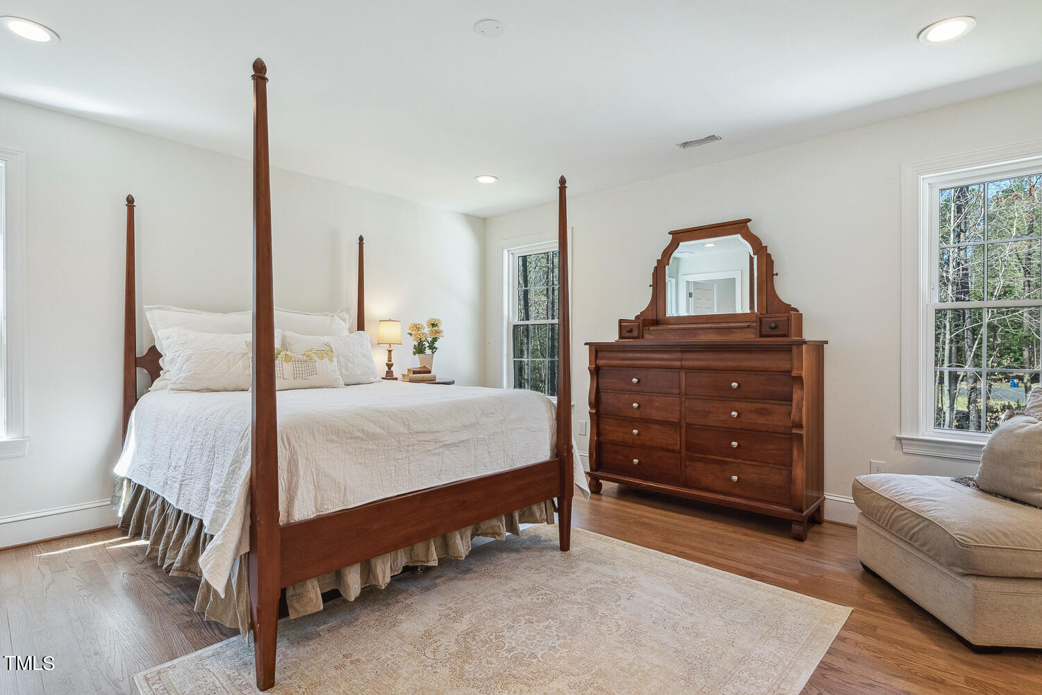5012 Boulder Creek Lane Raleigh, NC 27613 - Photo 80 of 100 a bed room with a bed and a dresser