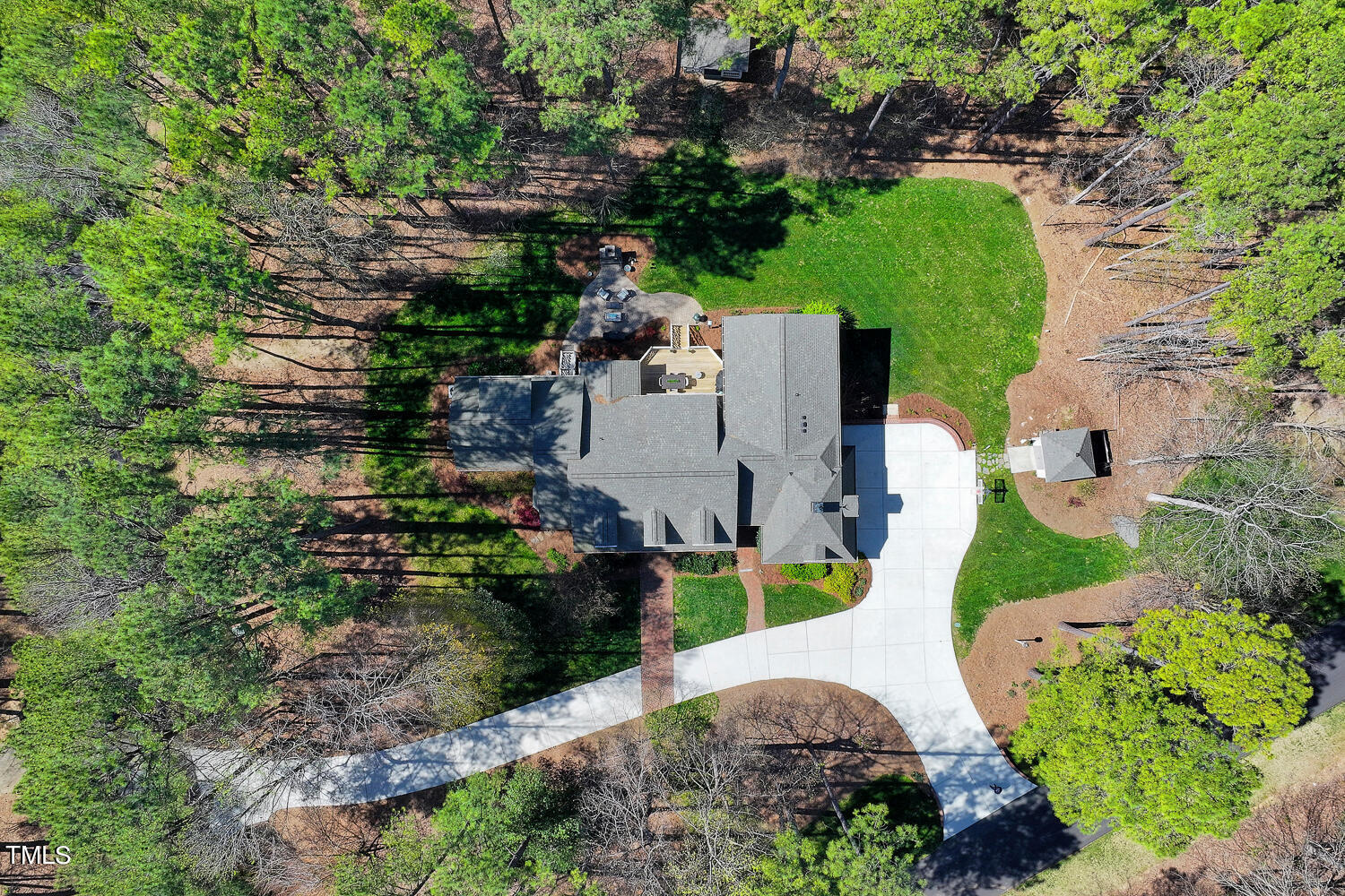 5012 Boulder Creek Lane Raleigh, NC 27613 - Photo 95 of 100 an aerial view of a house with a garden and plants