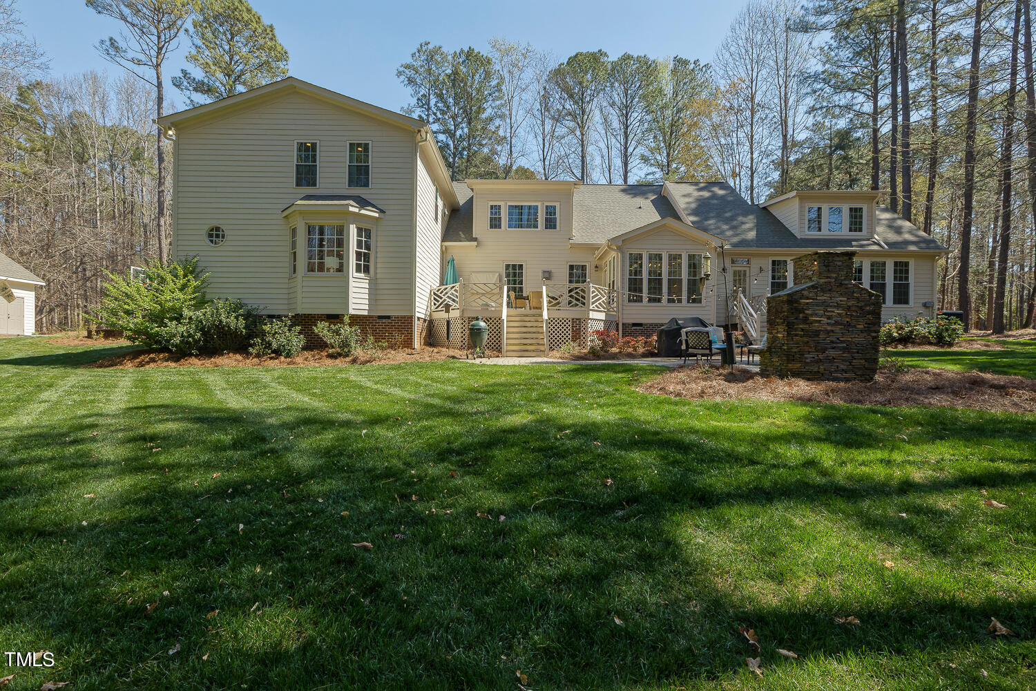 5012 Boulder Creek Lane Raleigh, NC 27613 - Photo 97 of 100 a front view of house with yard and green space