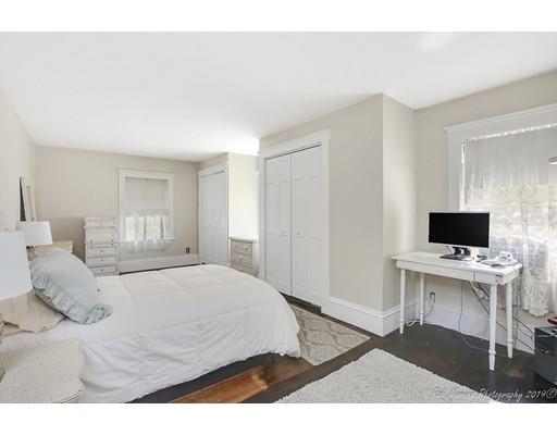 14 Overlook Road Wakefield, MA 01880 - Photo 15 of 28 a bedroom with a bed and a flat screen tv