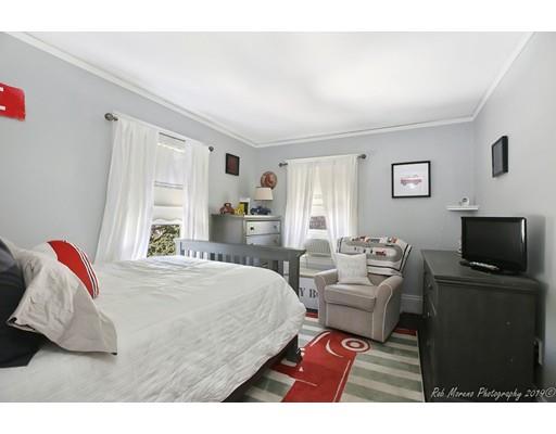 14 Overlook Road Wakefield, MA 01880 - Photo 17 of 28 a bedroom with a bed and a flat screen tv
