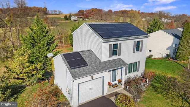 an aerial view of residential building with outdoor space