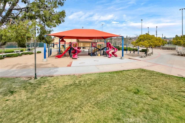 a view of a park with umbrellas