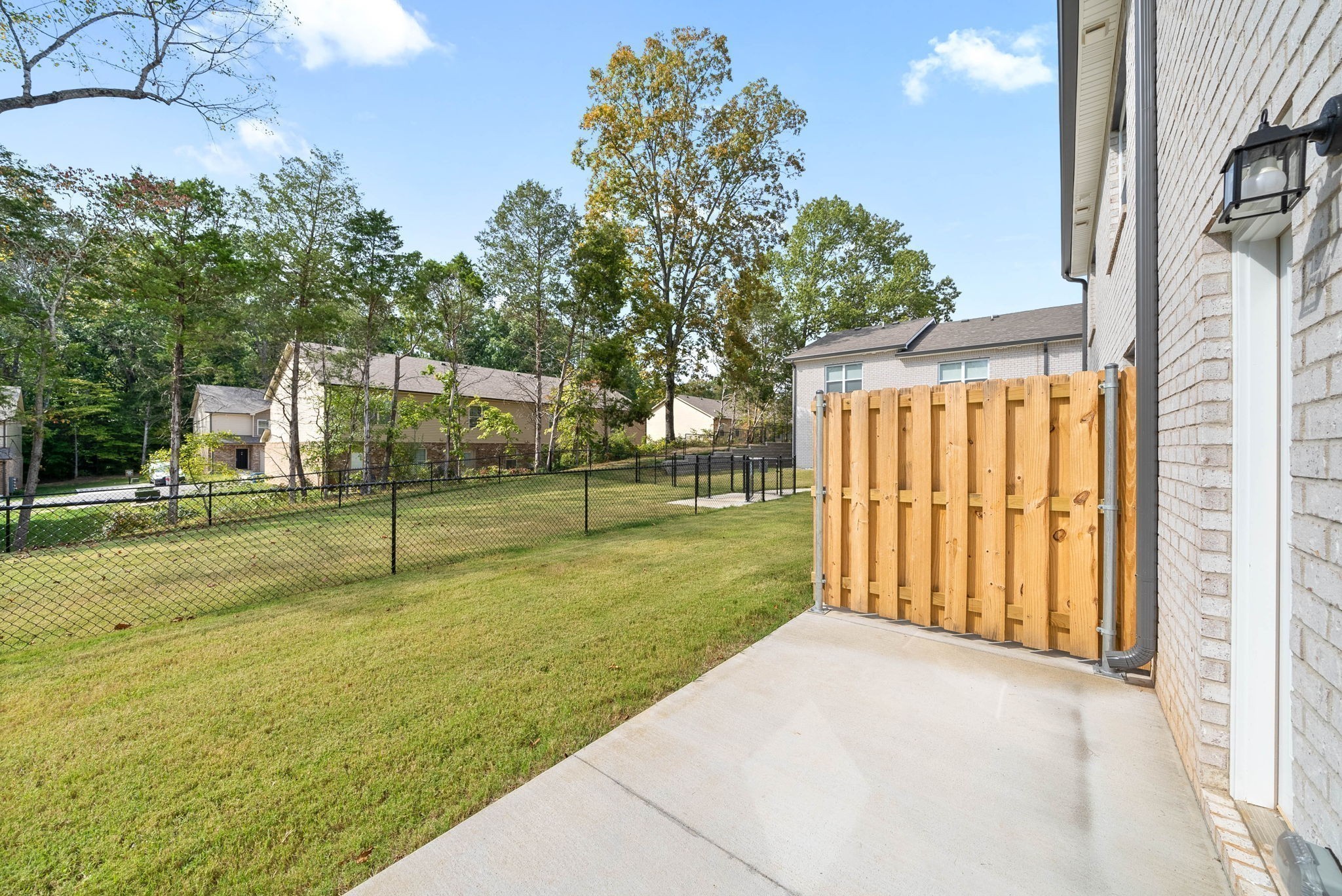 303 Longshadow Trail, Unit F Clarksville, TN 37043 - Photo 23 of 29 a view of a backyard with trampoline