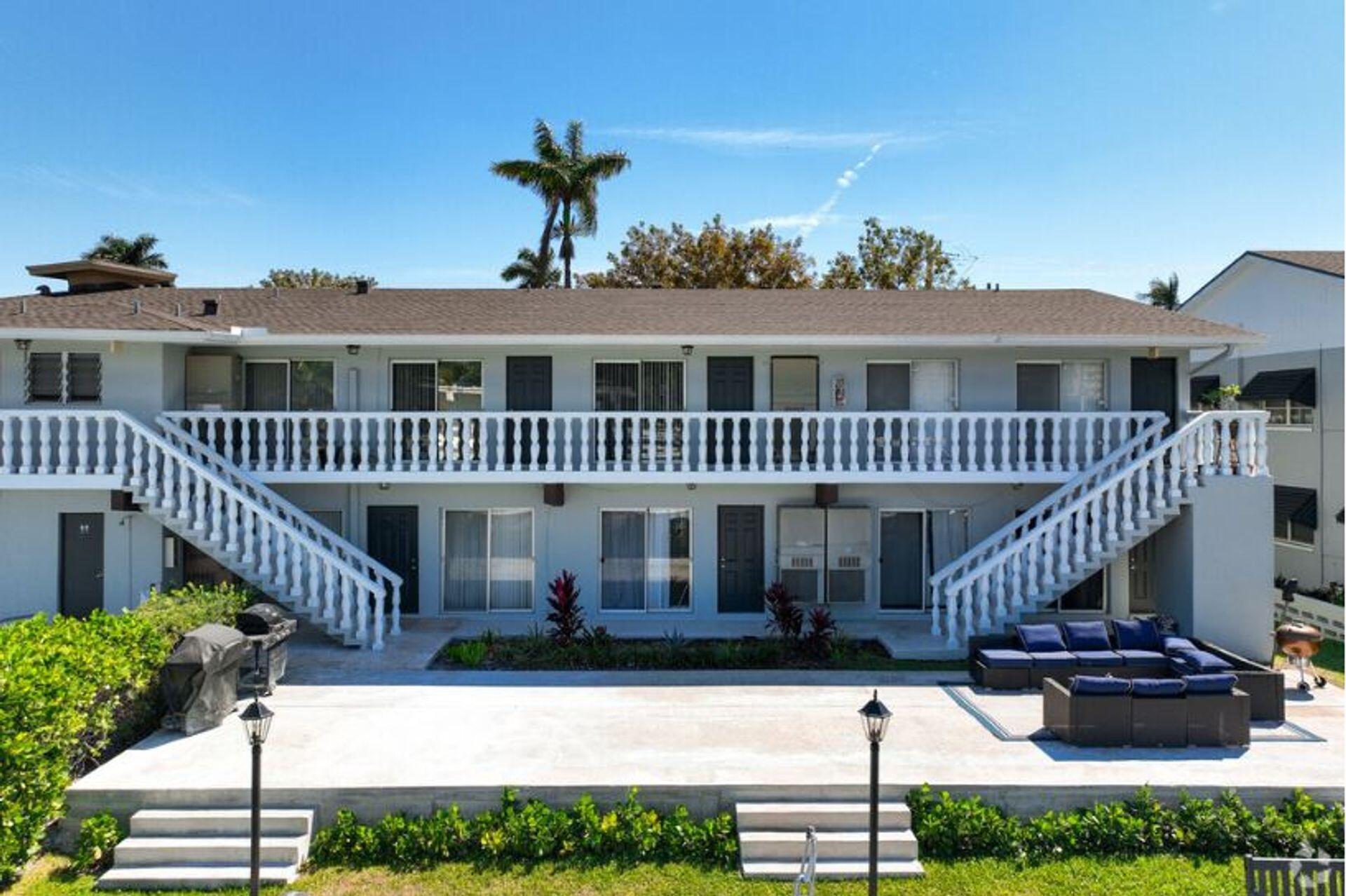 811 Southeast 22nd Avenue, Unit 12 Pompano Beach, FL 33062 - Photo 14 of 25 a front view of a house with a garden