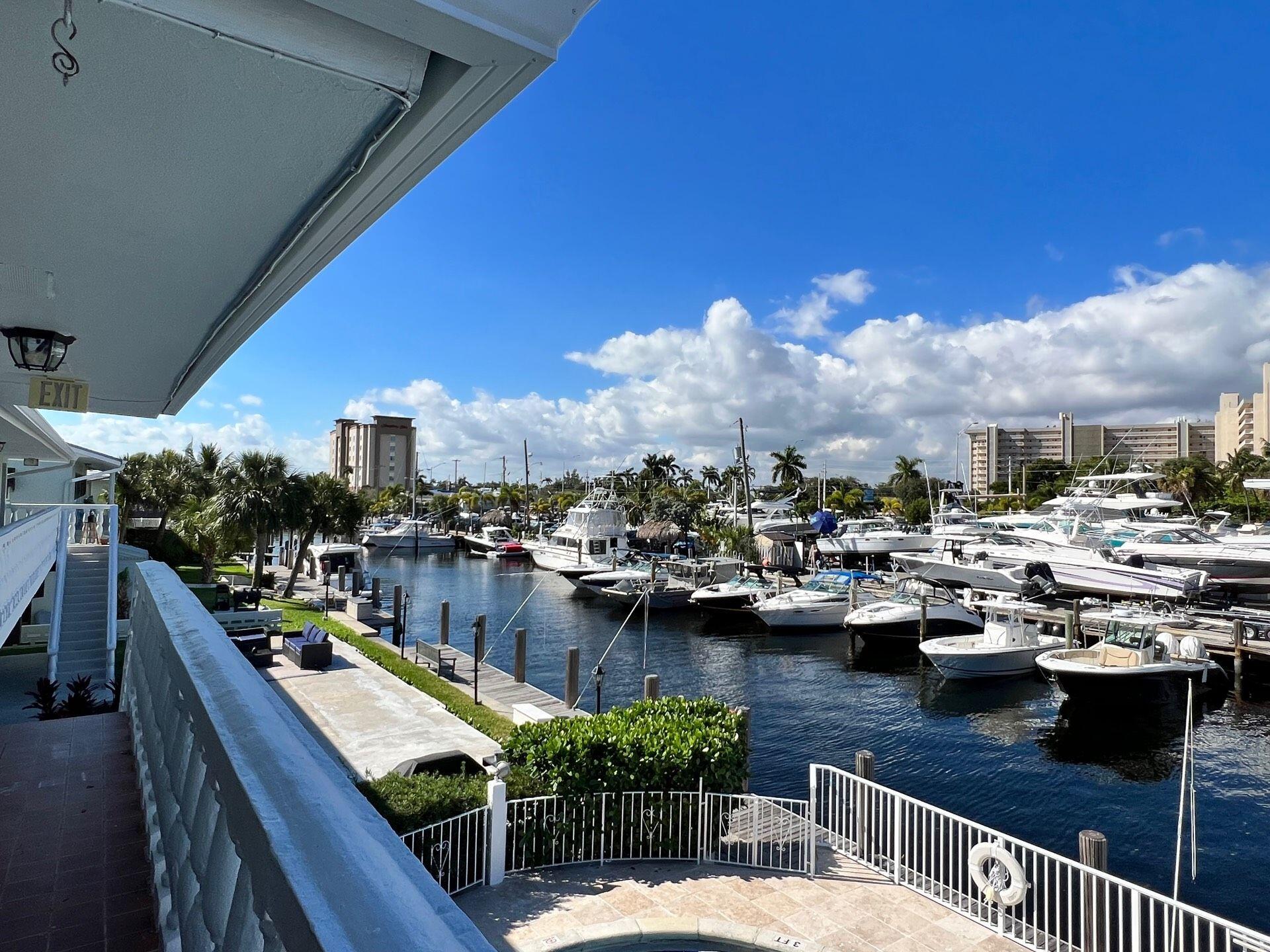 811 Southeast 22nd Avenue, Unit 12 Pompano Beach, FL 33062 - Photo 16 of 25 a view of swimming pool from a balcony