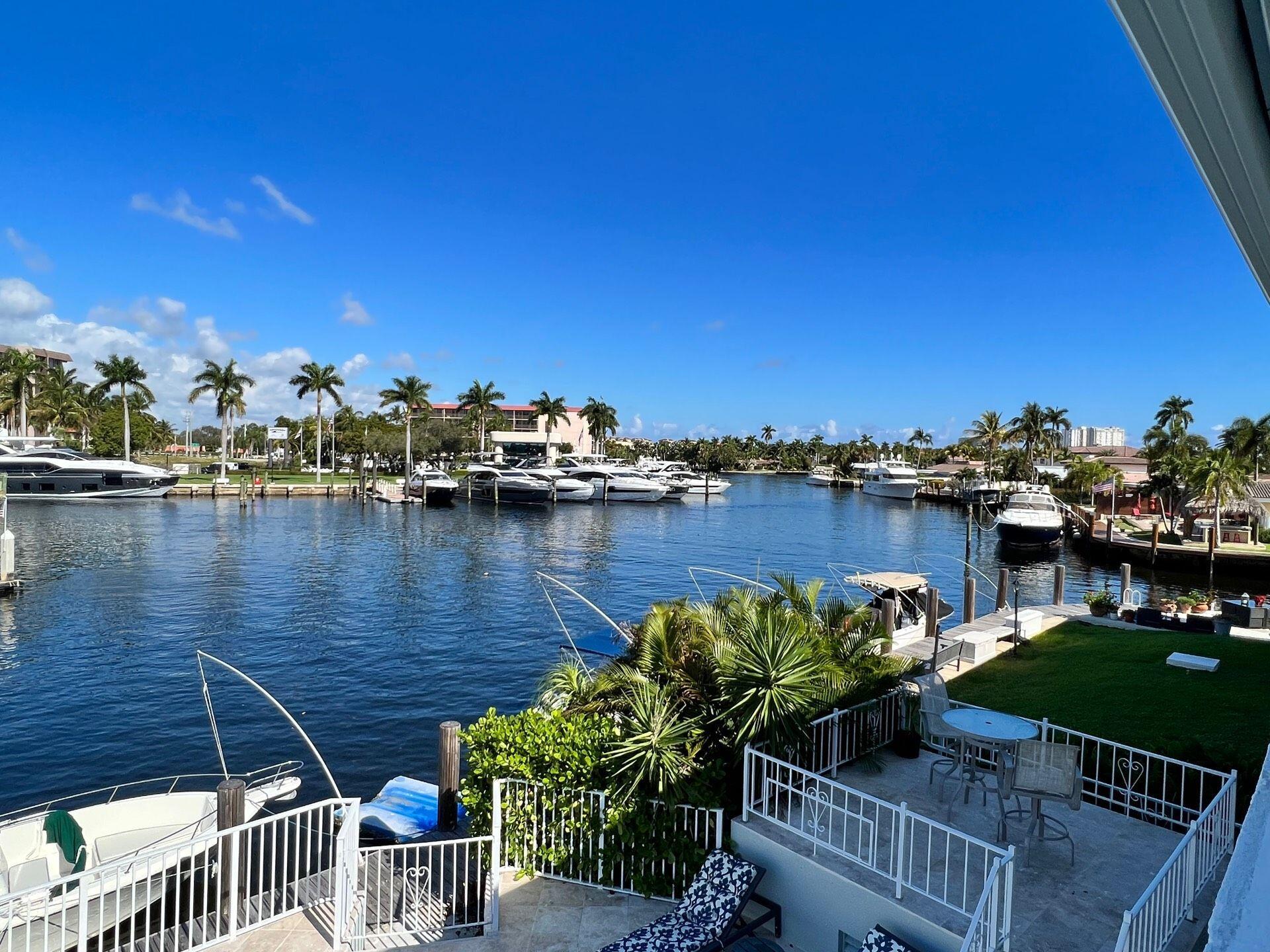 811 Southeast 22nd Avenue, Unit 12 Pompano Beach, FL 33062 - Photo 17 of 25 a view of a lake with a terrace