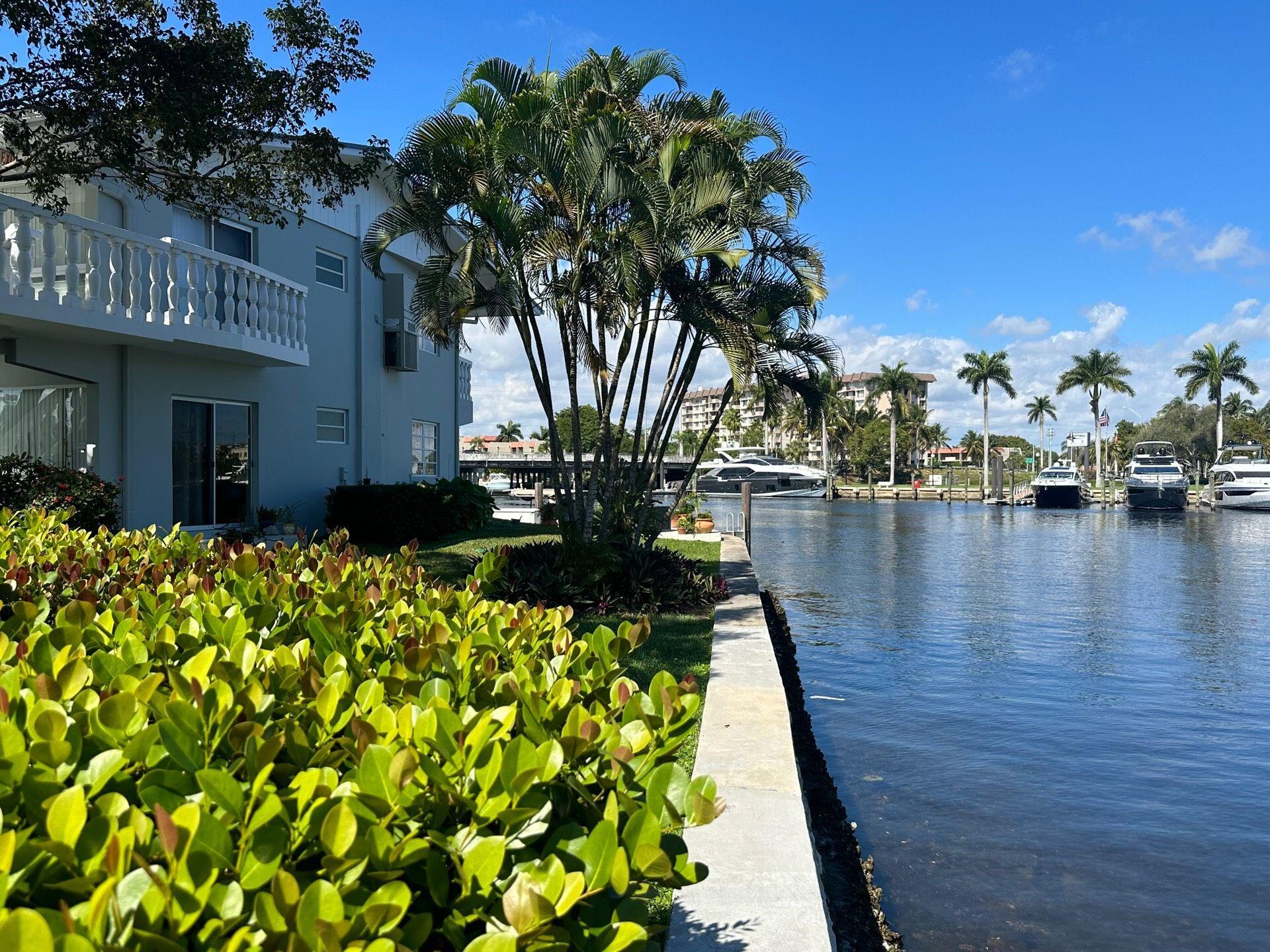 811 Southeast 22nd Avenue, Unit 12 Pompano Beach, FL 33062 - Photo 20 of 25 a view of a pond with potted plants