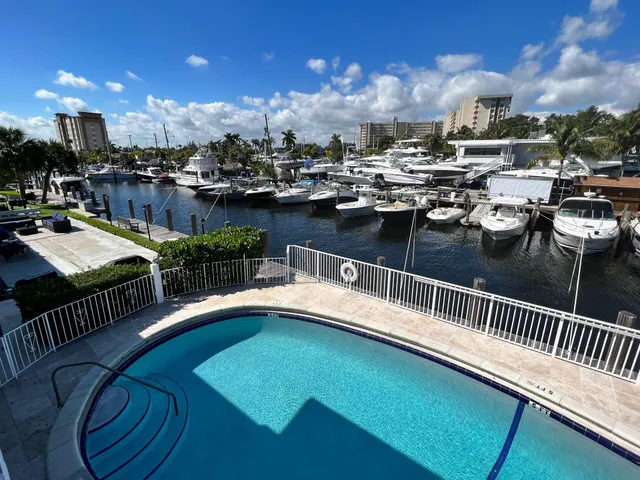 a view of a balcony with swimming pool