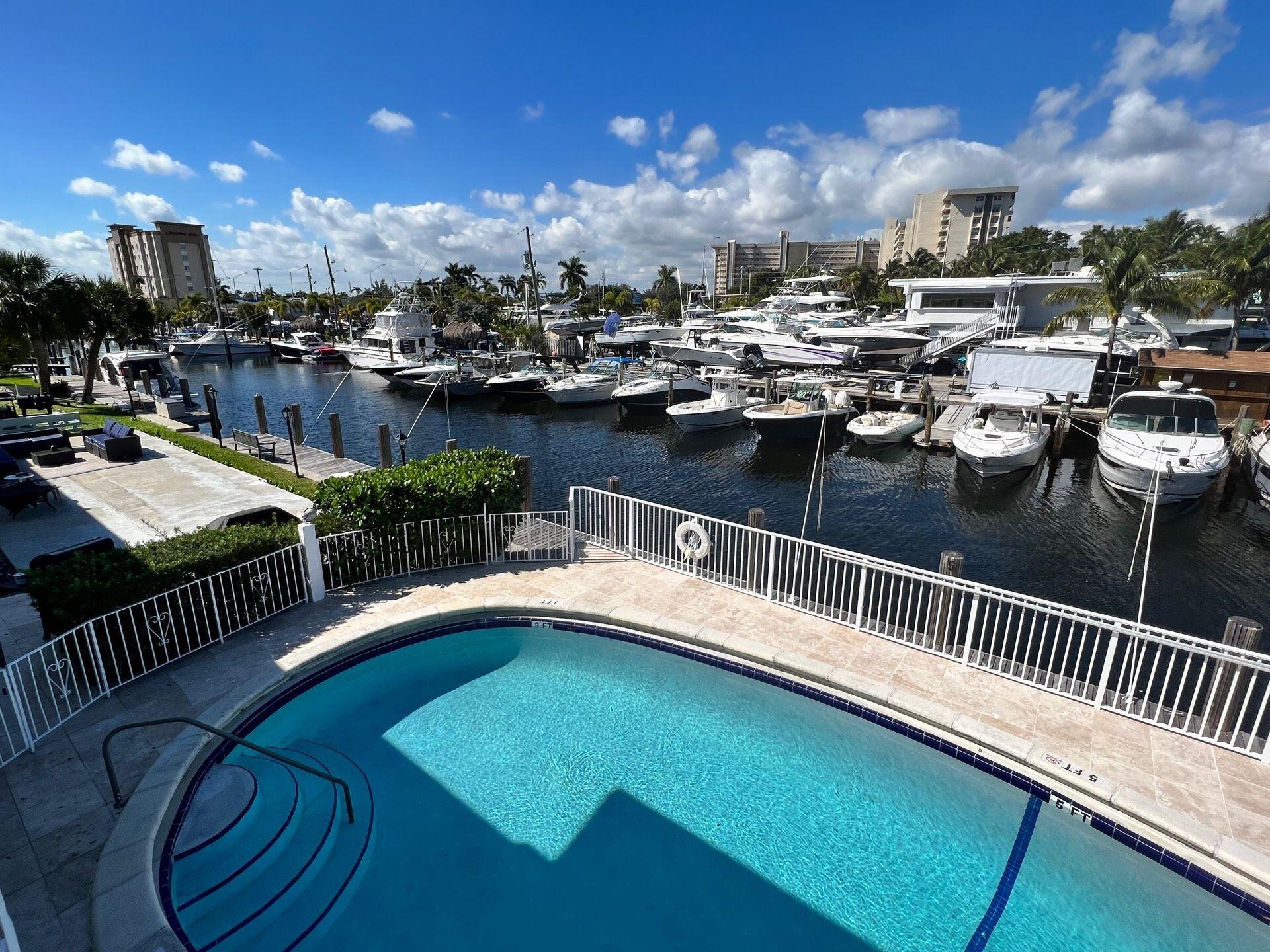 811 Southeast 22nd Avenue, Unit 12 Pompano Beach, FL 33062 - Photo 4 of 25 a view of a balcony with swimming pool