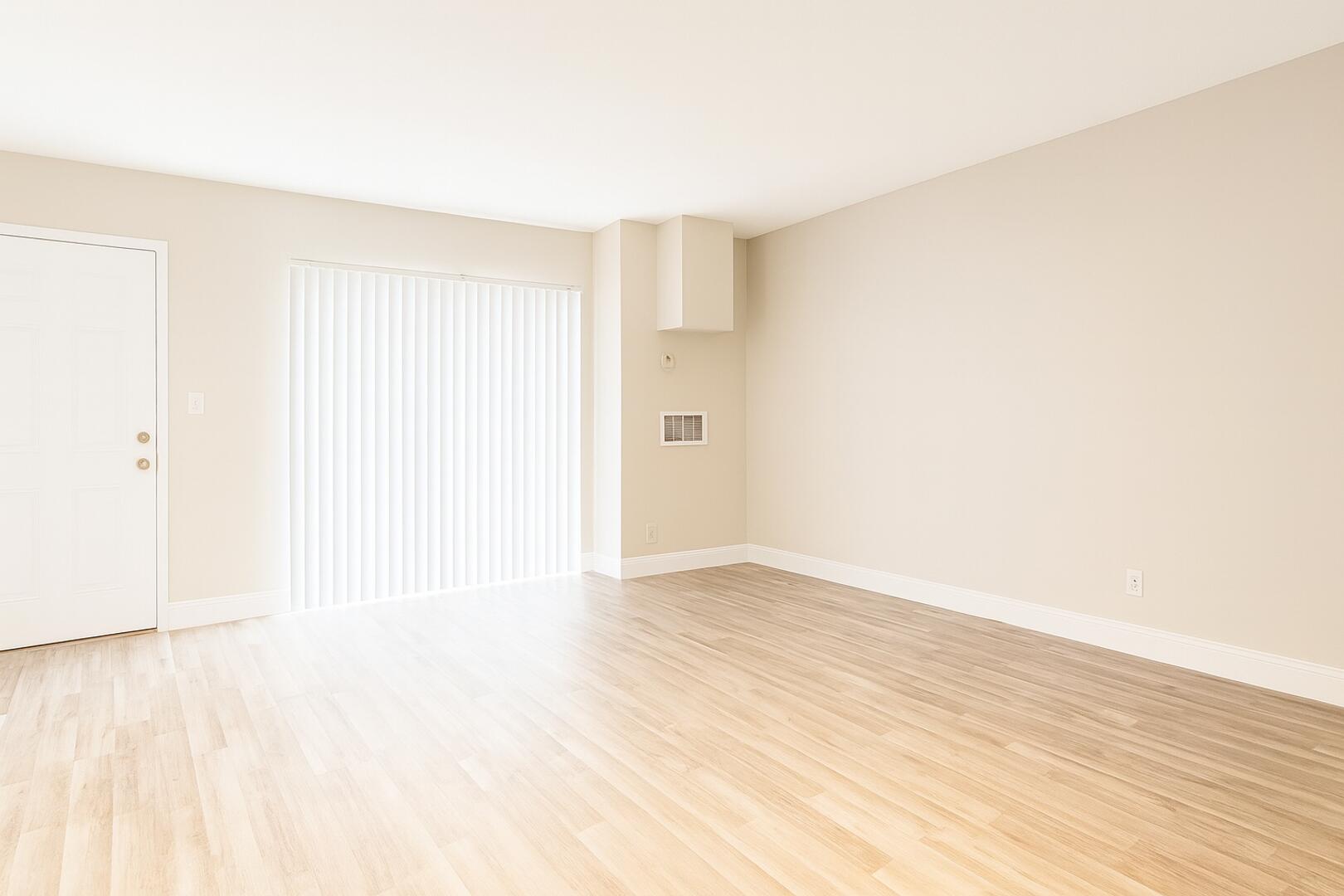811 Southeast 22nd Avenue, Unit 12 Pompano Beach, FL 33062 - Photo 6 of 25 a view of an empty room with wooden floor