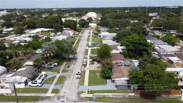 an aerial view of a house with a garden