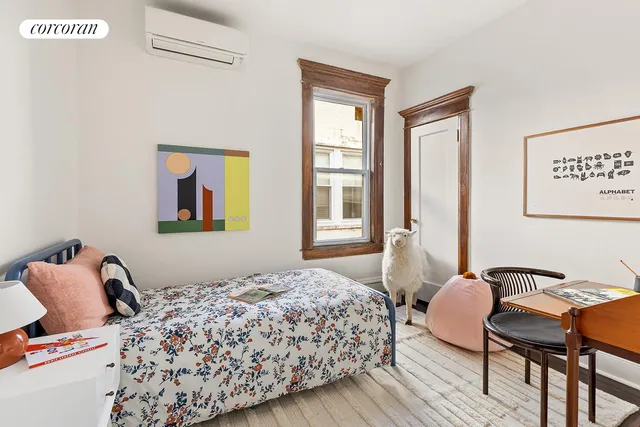 a bathroom with a bathtub and a sink
