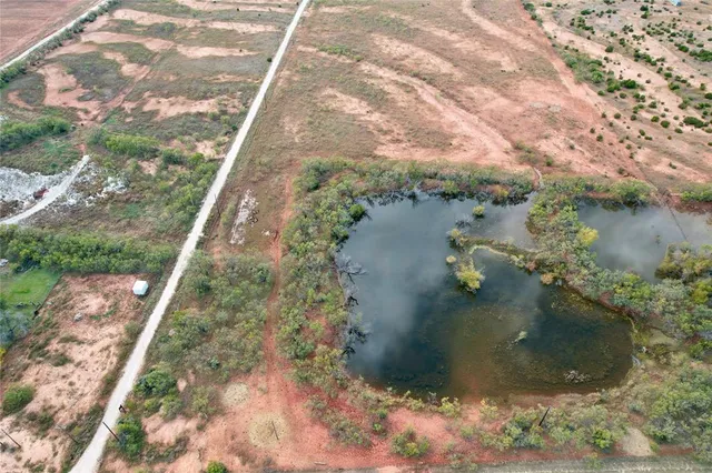 a view of a backyard of a house