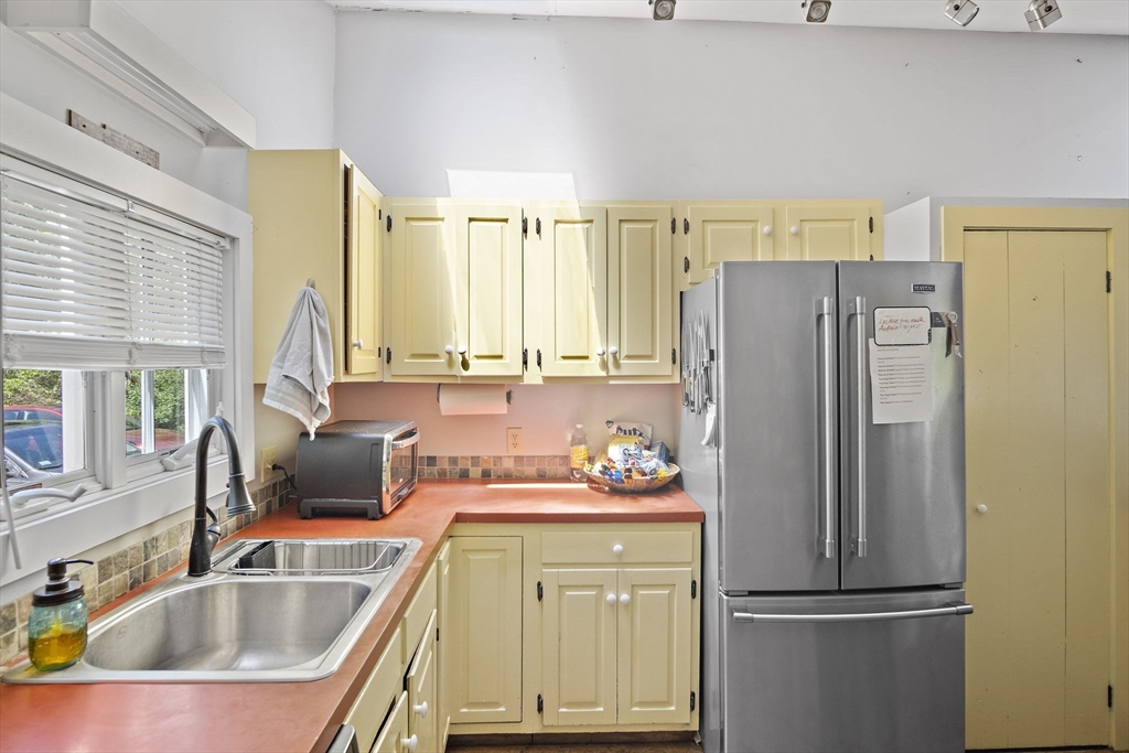 2 Highfield Road Newbury, MA 01951 - Photo 17 of 36 a kitchen with refrigerator a sink dishwasher a refrigerator and a sink with wooden floor