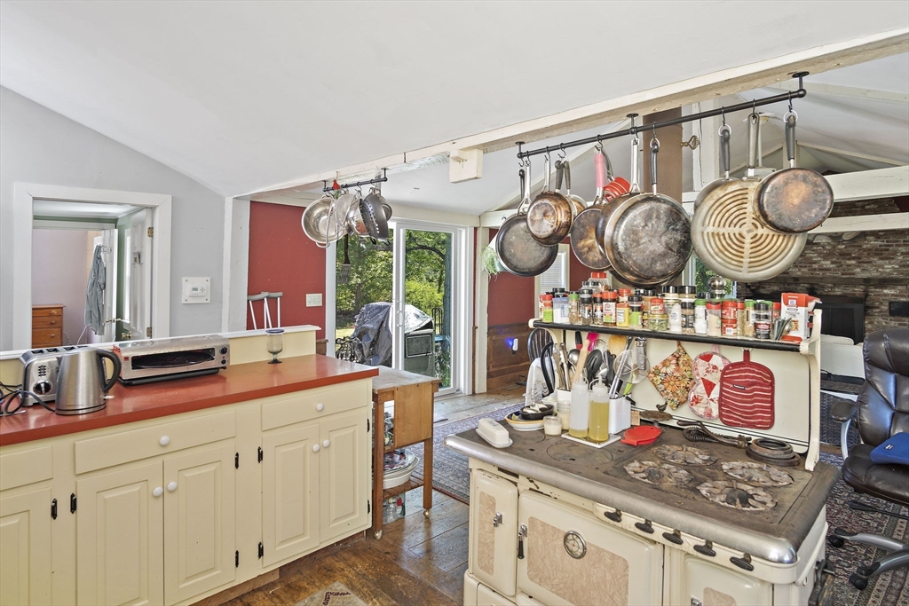 2 Highfield Road Newbury, MA 01951 - Photo 18 of 36 a view of a kitchen with stove and cabinets