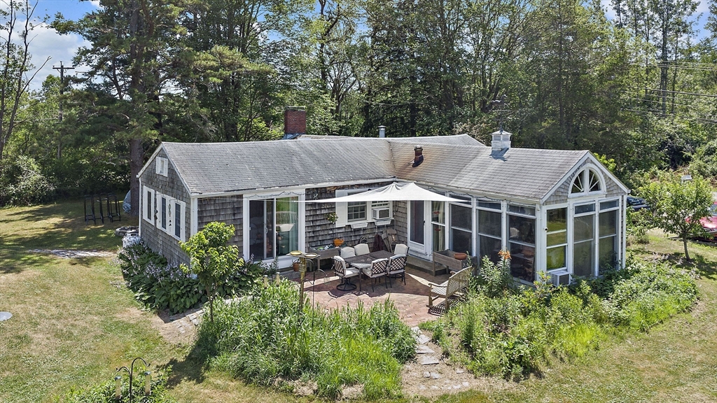 2 Highfield Road Newbury, MA 01951 - Photo 2 of 36 a aerial view of a house with a garden and plants