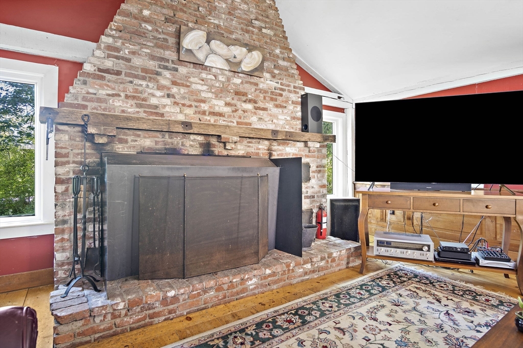 2 Highfield Road Newbury, MA 01951 - Photo 22 of 36 a living room with furniture and a flat screen tv