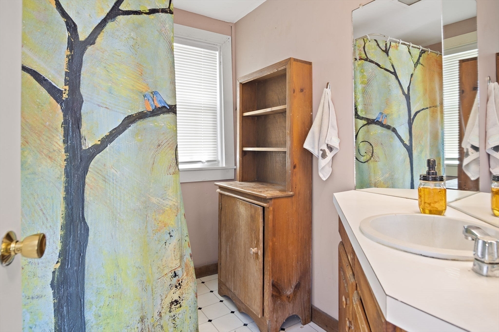 2 Highfield Road Newbury, MA 01951 - Photo 25 of 36 a view of walk in closet with wooden floor and mirror