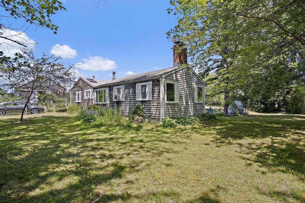 2 Highfield Road Newbury, MA 01951 - Photo 31 of 36 a front view of a house with a garden